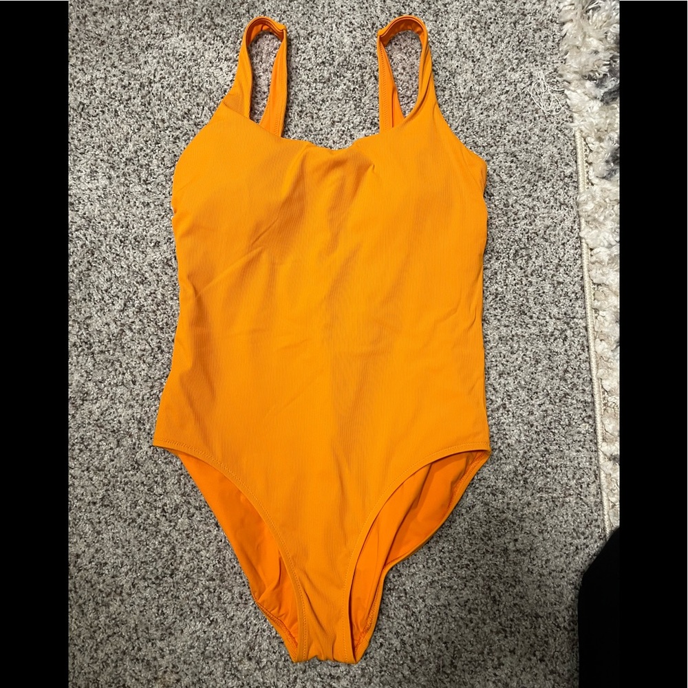 Athleta one piece, orange, size medium, like new.